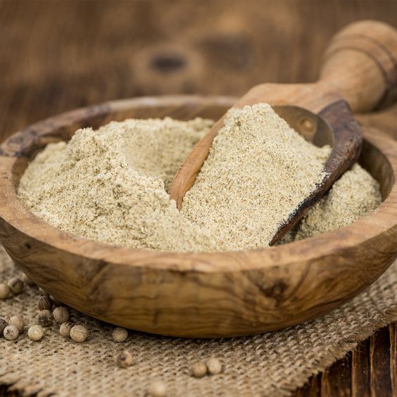 Model wearing plain white basic tee.